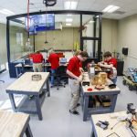 4 students working in astrobotics lab