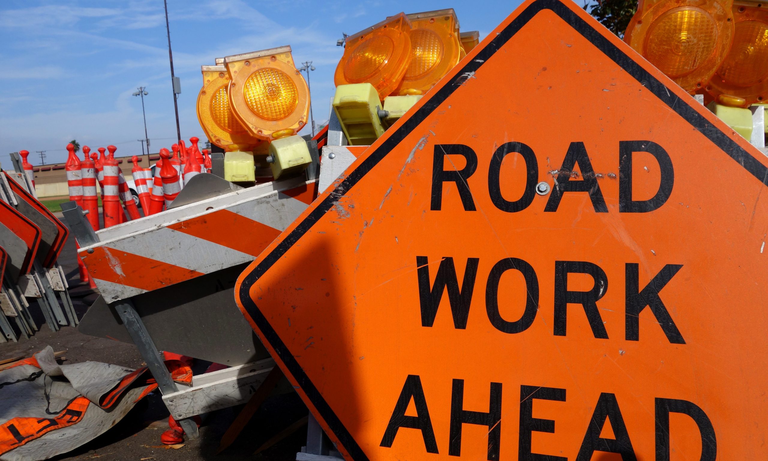 Close up of road work sign and traffic warning items
