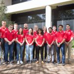 Ohio State University EcoCAR Team stands outside a building