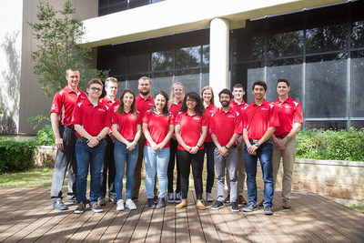 Ohio State University EcoCAR Team stands outside a building