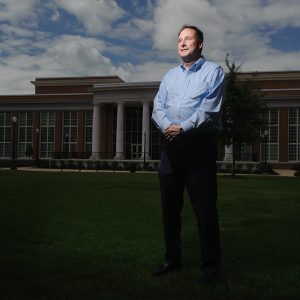 Robert Lightfoot stands on the grass outside of The Ferg.