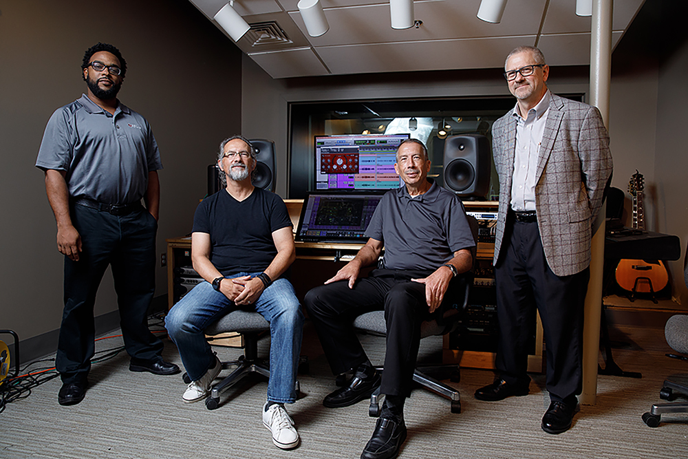 4 men in the new musical engineering lab