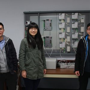 Twostudents stand in an on-campus lab