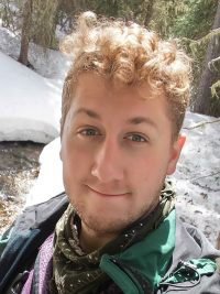 Photo of a man with blond hair outside