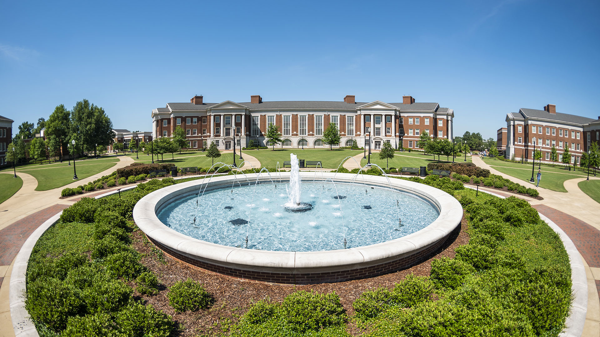 The south research center building on a sunny day with fountain out front