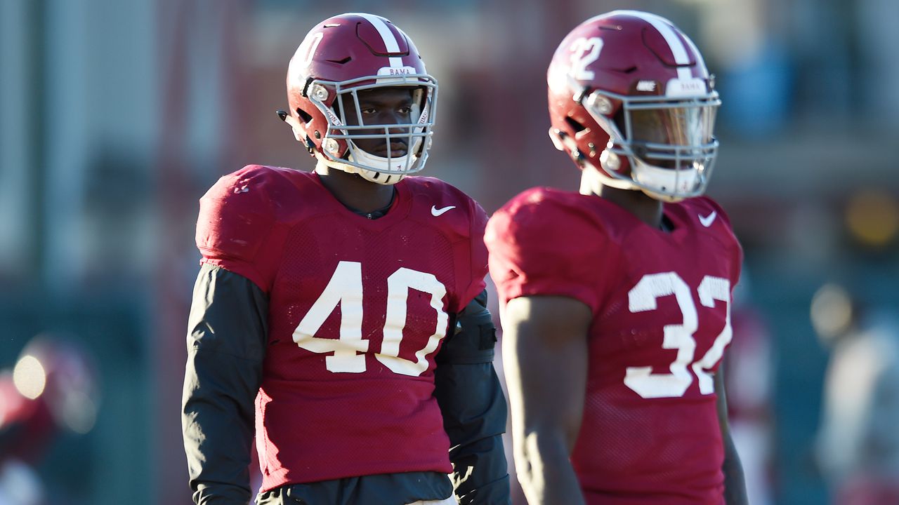 Two football players on the field