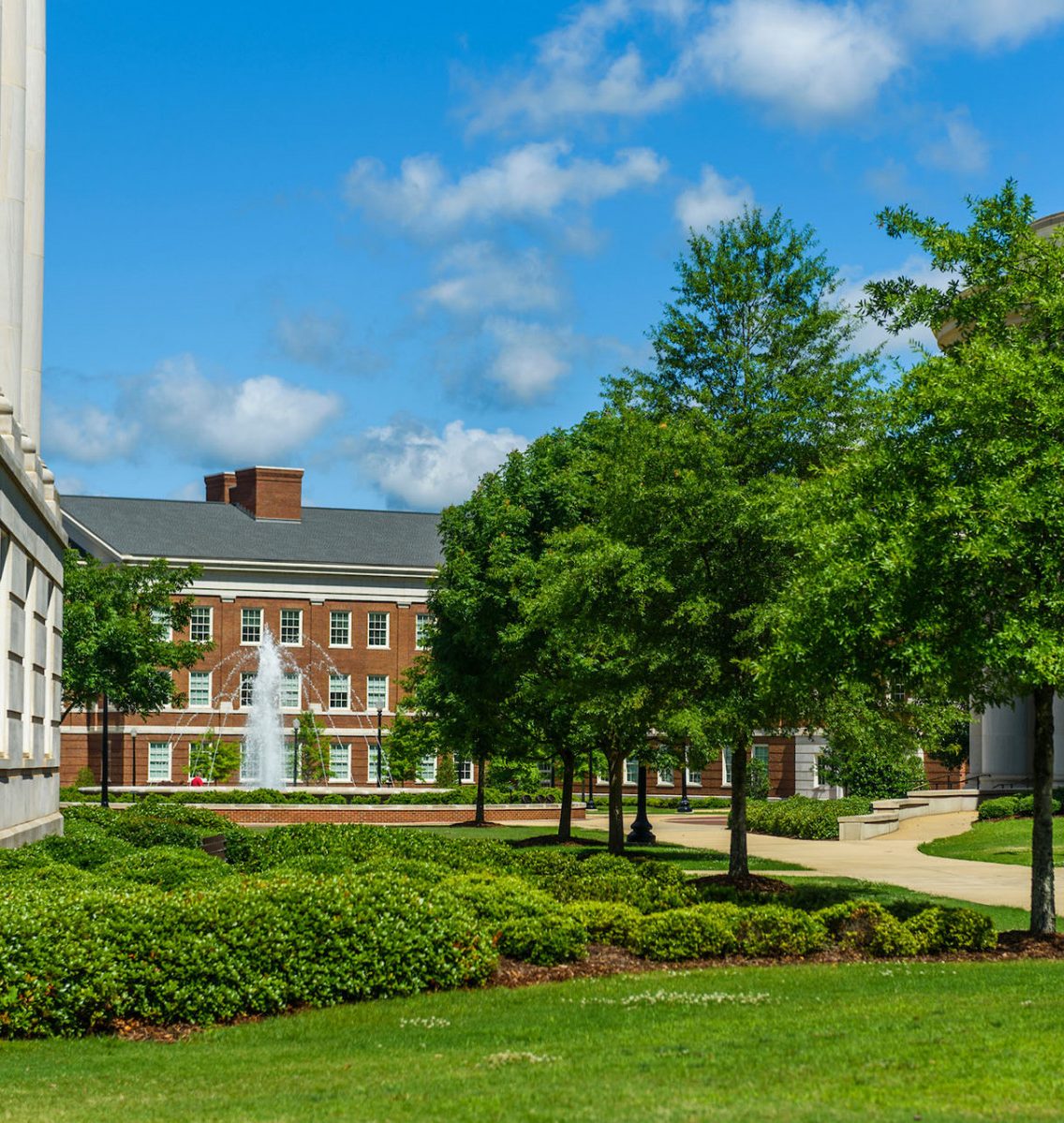 Outside shot of Engineering quad with fountain and trees on a sunny day