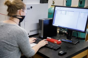 Woman on a computer in lab