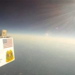 View of the sign 'Project Firefly' from high up in the earths upper atmosphere