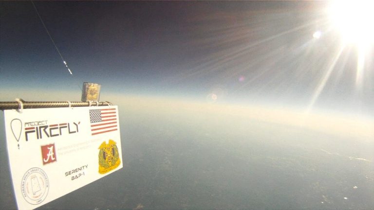 View of the sign 'Project Firefly' from high up in the earths upper atmosphere