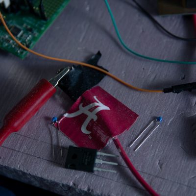 wires and a walking A tape on a board