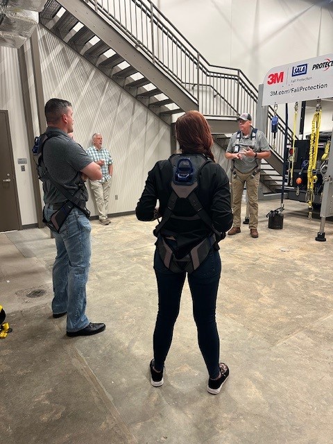 People standing in a large open interior