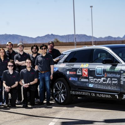 people sitting beside an ecocar