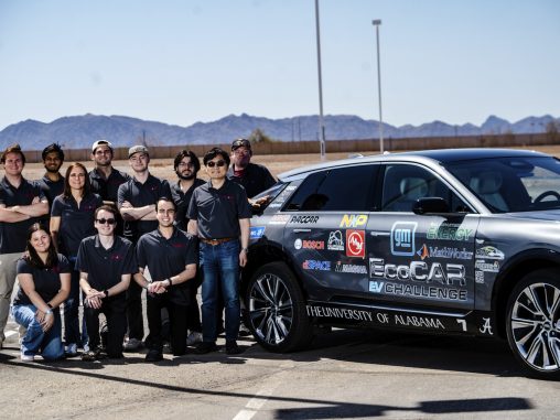 people sitting beside an ecocar