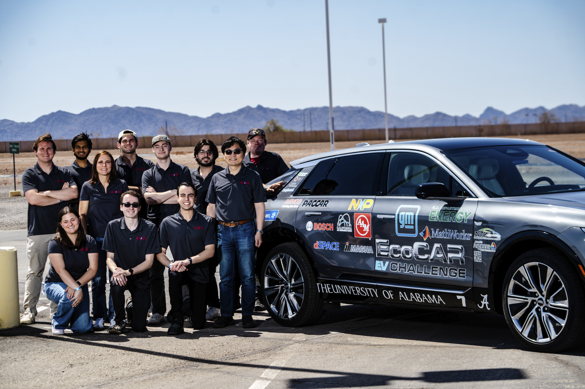 people sitting beside an ecocar
